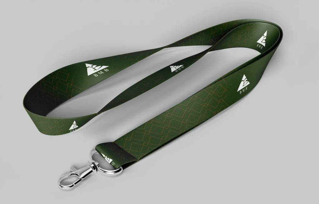 Collier vert avec des motifs en triangle orange , et des logos blancs de Bespoke Mountain Bike