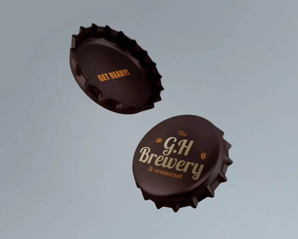 Capsule de bouteille pour "The Golden Hop Brewery". La capsule reprend les codes de la marque, le marron et le orange sont dominant.