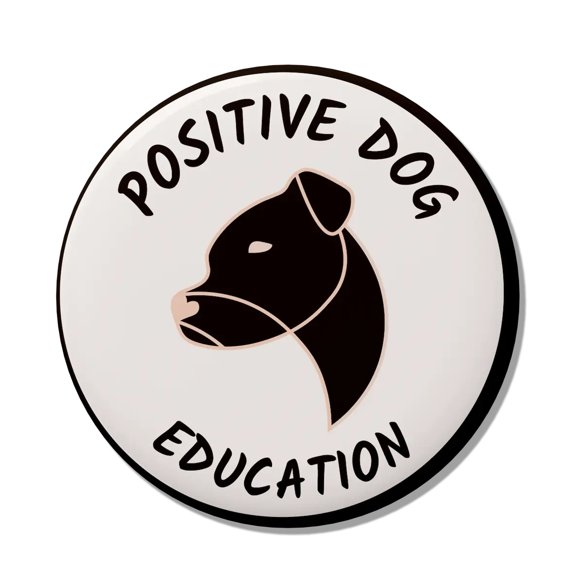 Badge représentant le logo de Positive Dog Education, illustration de la tete de son chien avec la truffe en forme de coeur.