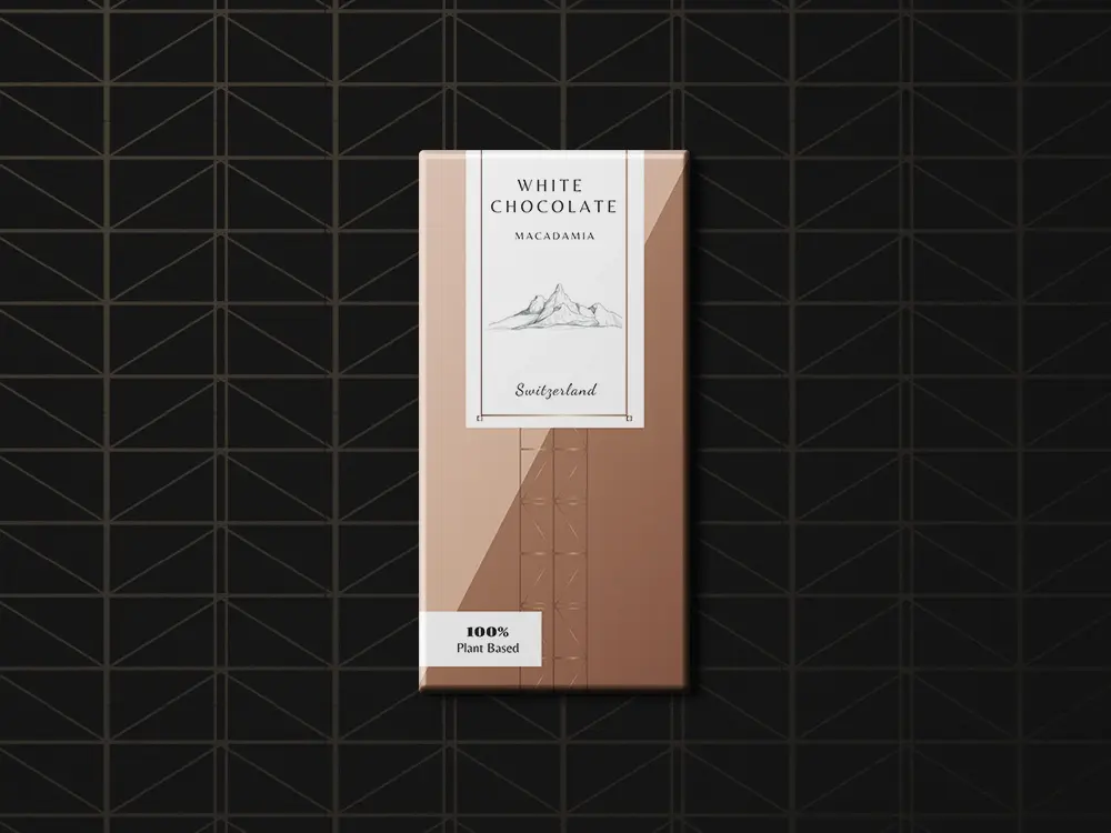 Packaging tablette de chocolat blanc, avec une image de montagne, design premium.
